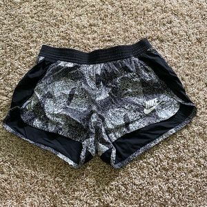 Black and white speckled nike athletic shorts
